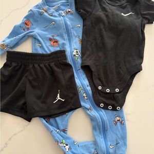 Nike Baby 6 month bundle. Tee and shorts are like new. Romper is used good cond.